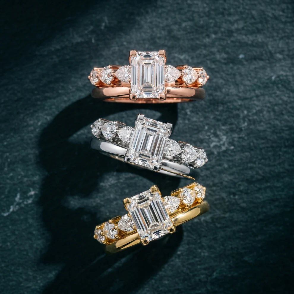 Emerald Cut Lab Grown Diamond & Moissanite Three Stone Engagement Ring with Pear Side Stones
