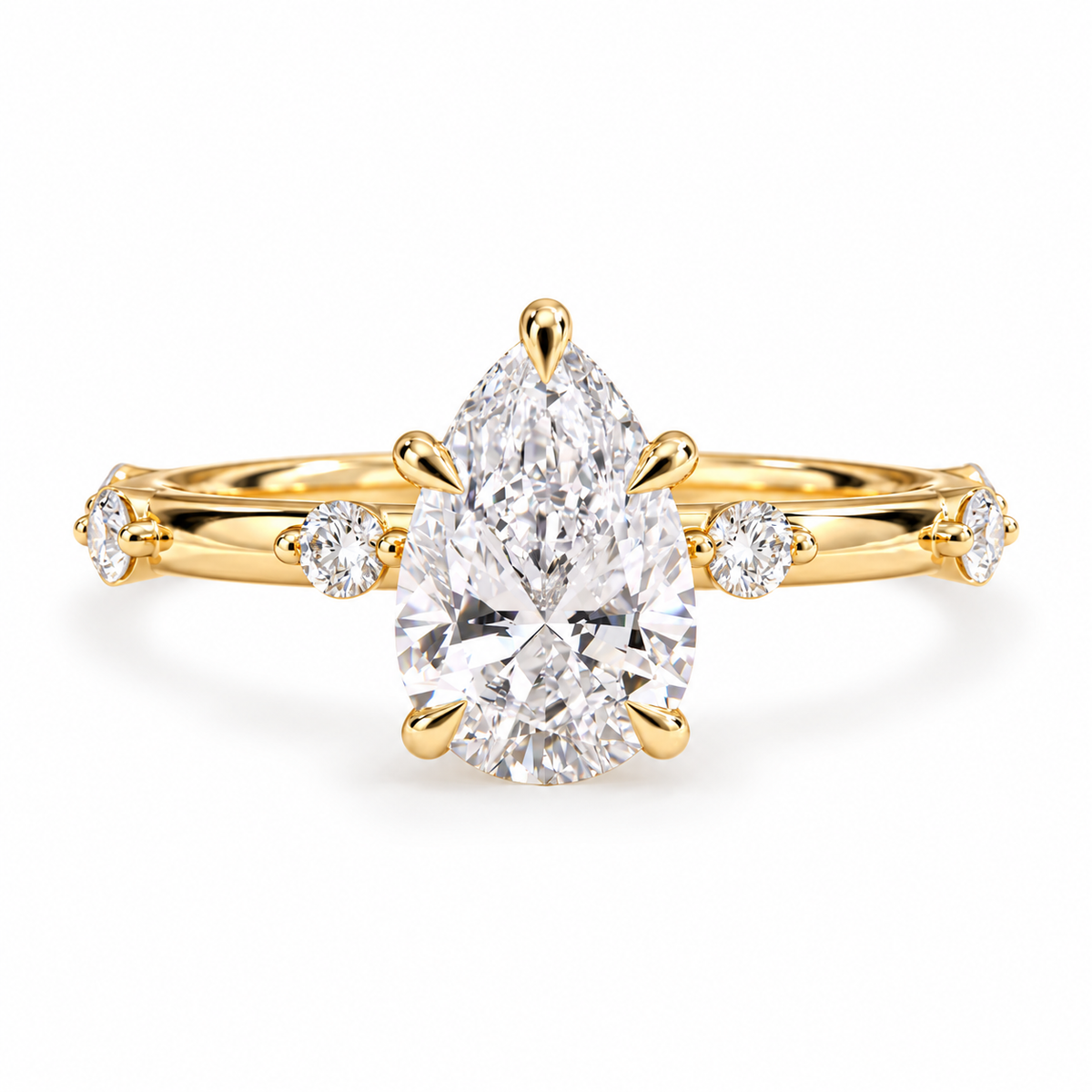 pear lab grown diamond engagement ring in gold, three-quarter view
