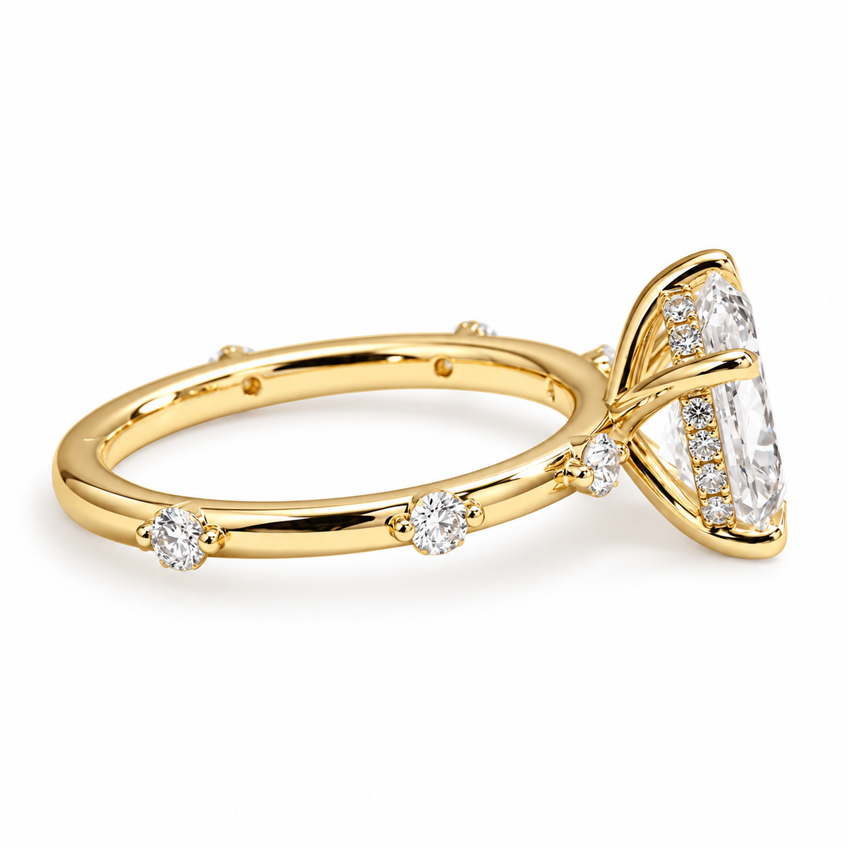 pear lab grown diamond engagement ring in gold, top view