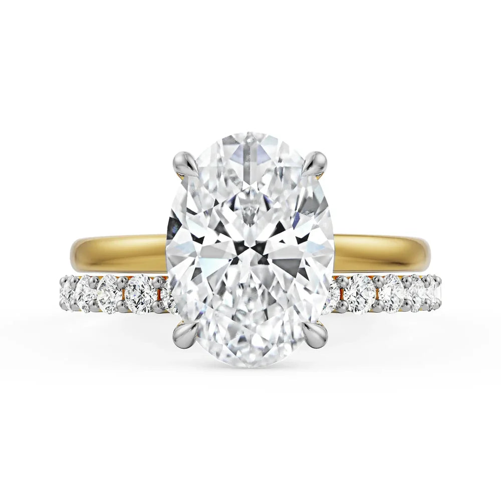 oval lab grown diamond engagement ring in 18K gold, top view