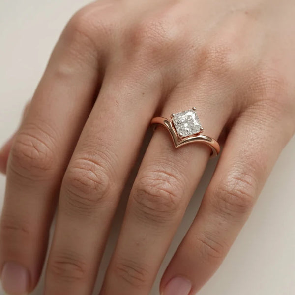 emerald lab grown diamond engagement ring in silver, three-quarter view