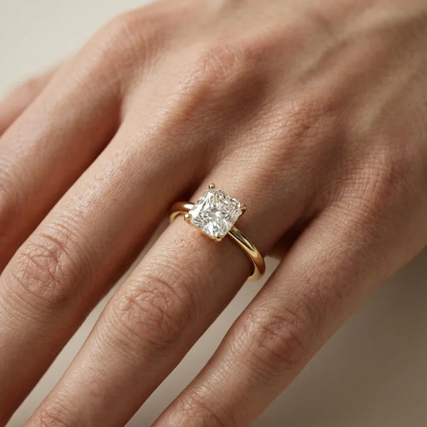 emerald lab grown diamond engagement ring in silver, three-quarter view
