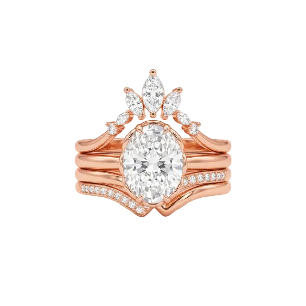 Rose gold ring with a large central diamond and smaller diamonds on a white background