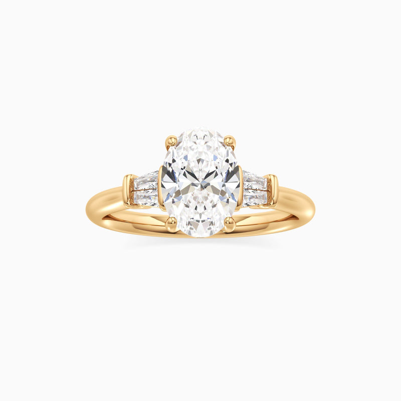 Oval Cut Lab Grown Diamond Three-Stone Engagement Ring with Tapered Baguettes