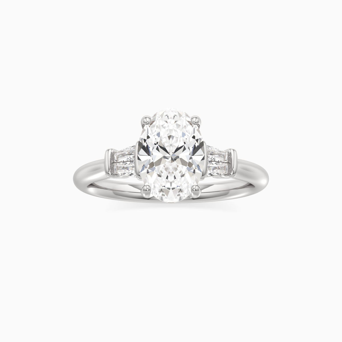 Oval Cut Lab Grown Diamond Three-Stone Engagement Ring with Tapered Baguettes