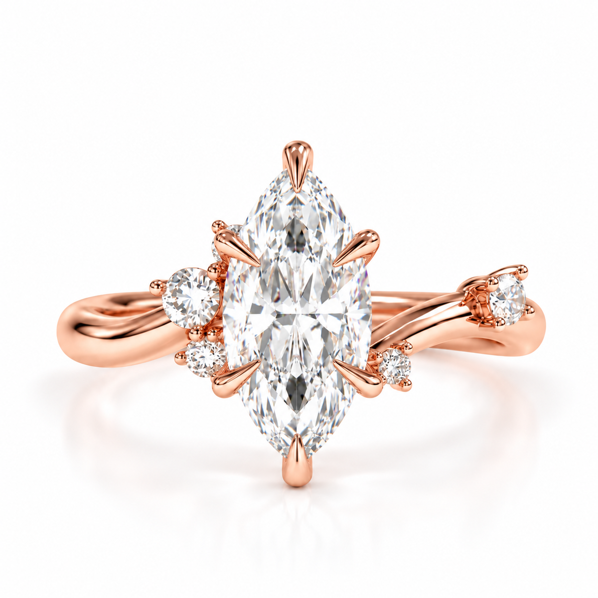 A rose gold ring featuring a marquise-cut diamond center stone with smaller round diamonds set along the shoulders of a split shank, shown on a plain white background.