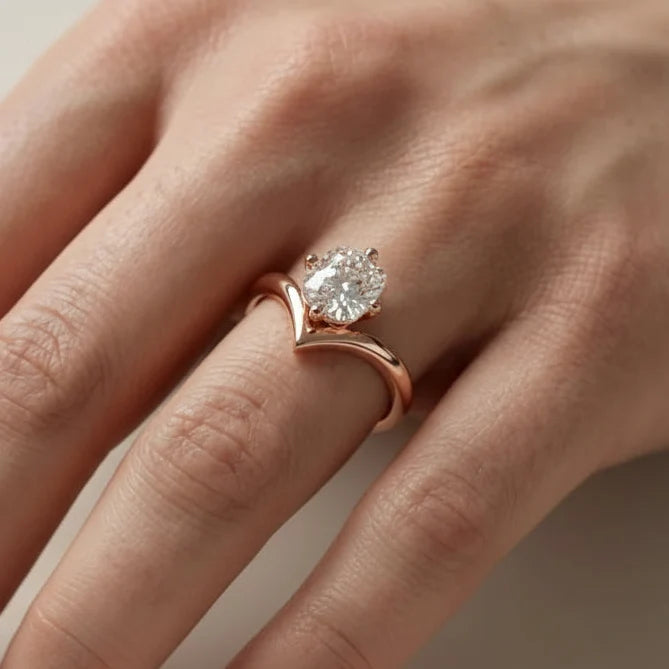 emerald lab grown diamond engagement ring in silver, three-quarter view