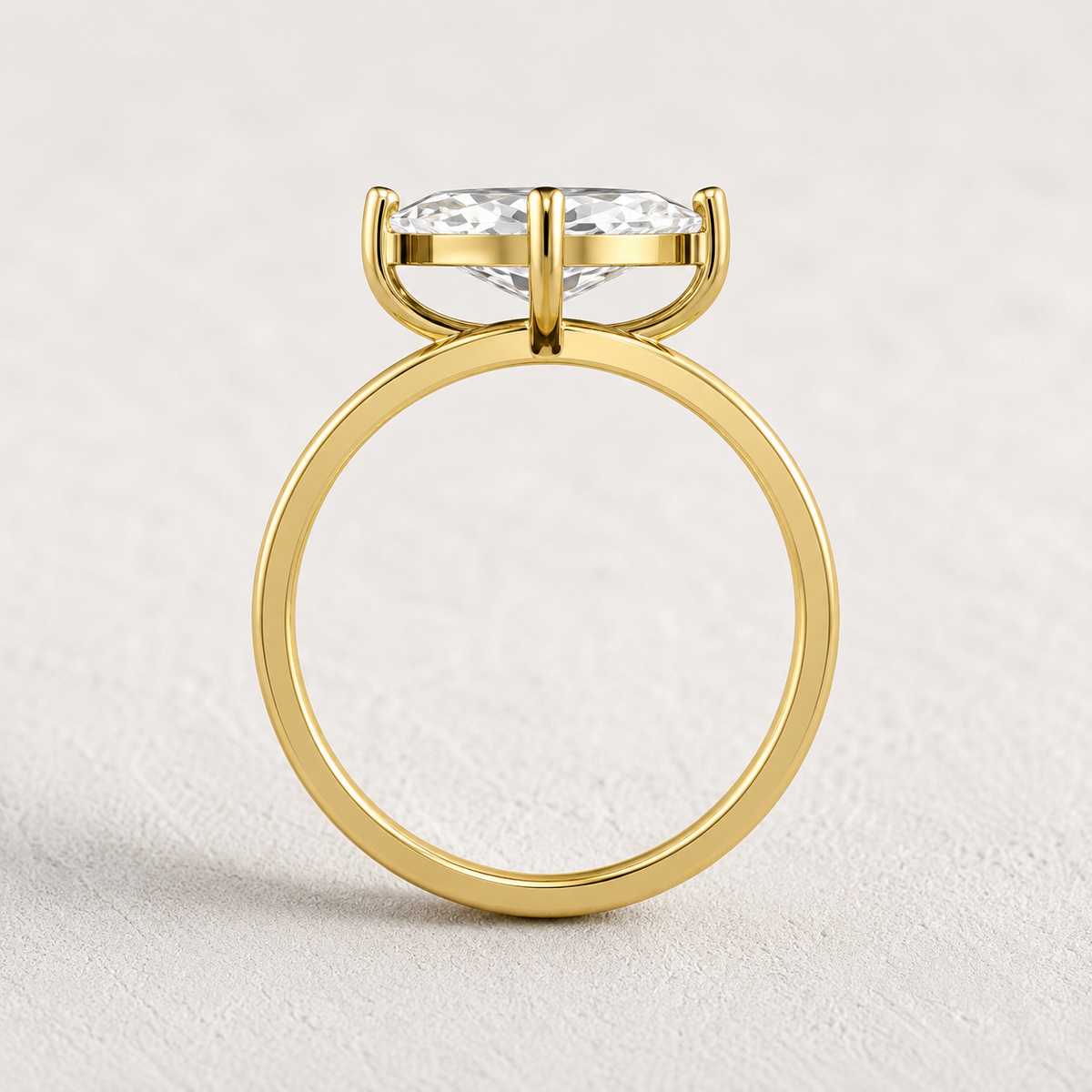 emerald lab grown diamond engagement ring in silver, on-hand view